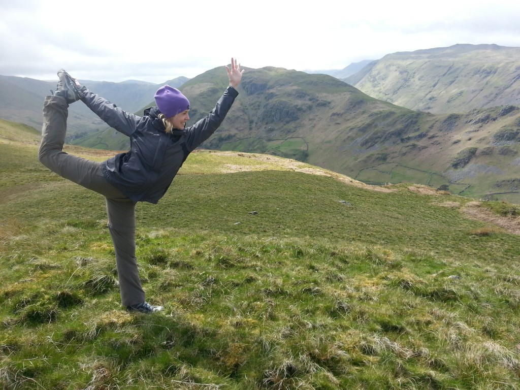 Lina doing dancer's pose in Lake District.